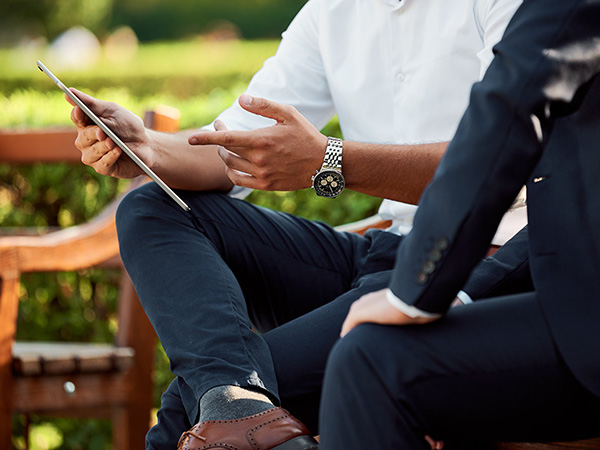 business-person-pointing-at-ipad